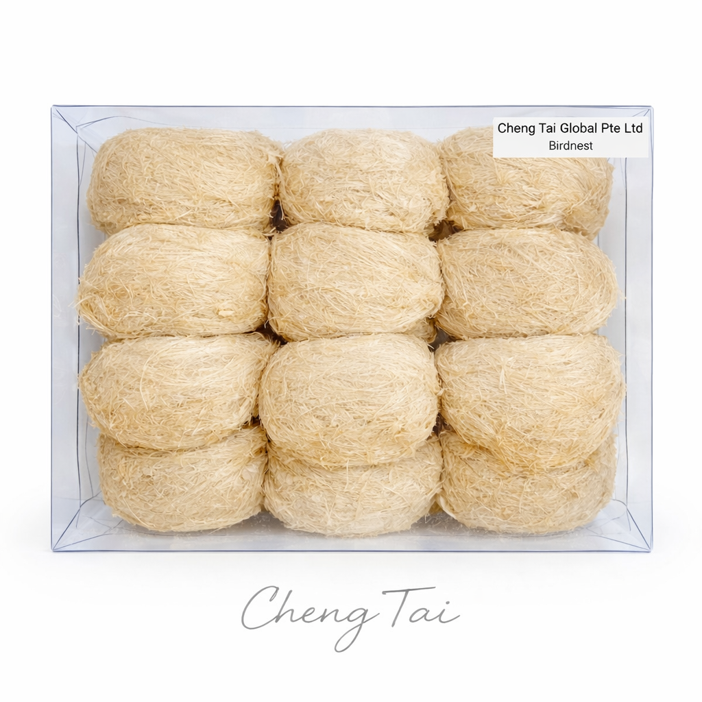 Box of Cheng Tai birdnest with multiple beige nests inside on a white background